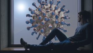 Koronavirus - muž u okna - koronakrize a nemovitosti